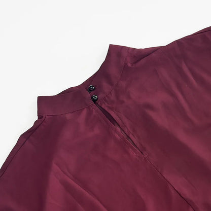 EtherealBe chic long sleeve o-neck sheer top in burgundy with button detail at the back