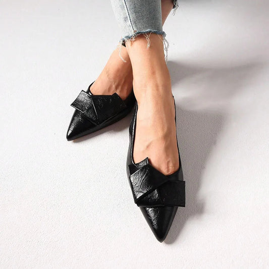 Chic office pleated slip-on flats with bow detail in black, perfect for stylish work attire