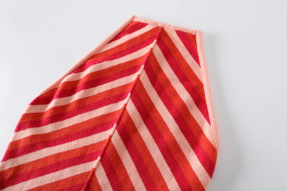 EtherealBe chic sleeveless lace-up halter dress featuring vibrant red and pink stripes