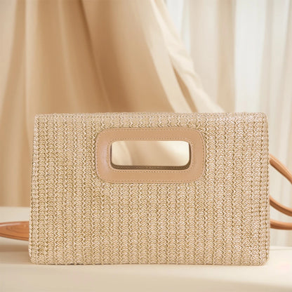 EtherealBe chic straw woven shoulder bag with a sleek design and unique cutout handle