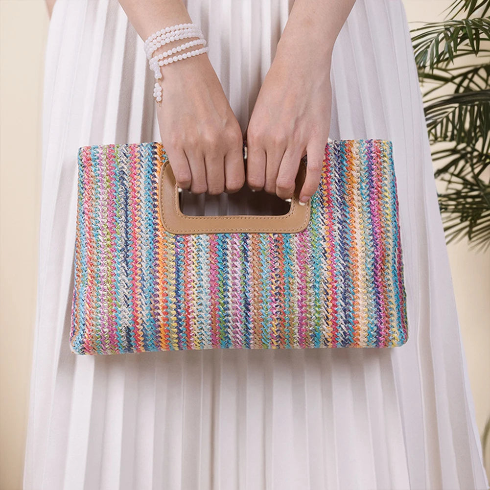 Chic straw woven shoulder bag in vibrant colors with a stylish handle for fashionable outings