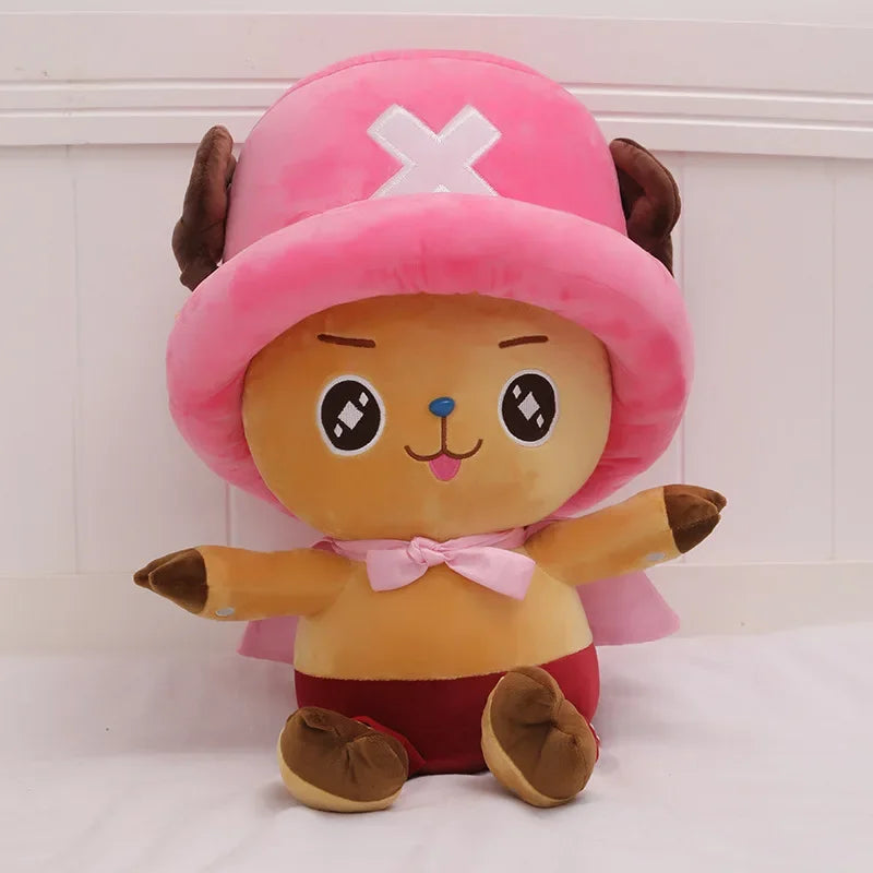 Cute Chopper anime kids plush toy in pink hat with playful expression and soft fabric