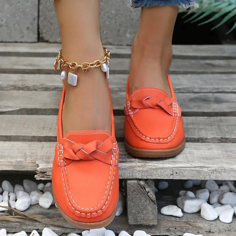 EtherealBe comfortable slip on flats for women in vibrant orange with a braided detail