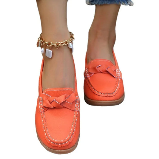 EtherealBe comfortable slip on flats for women in vibrant orange with braided detail and casual style