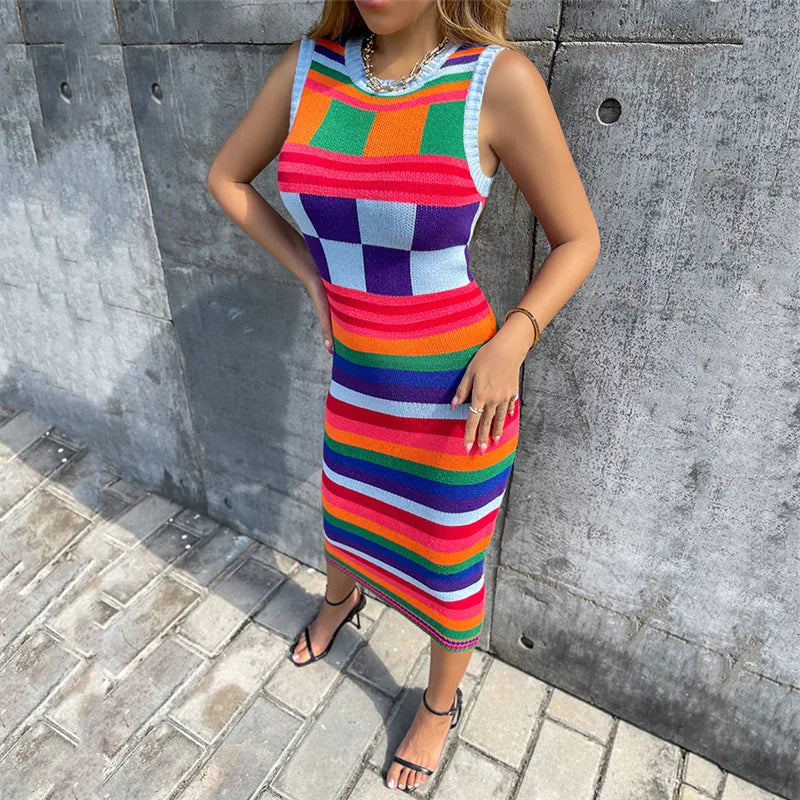 Stylish contrasting color knitted dress for women featuring vibrant stripes and a fitted design