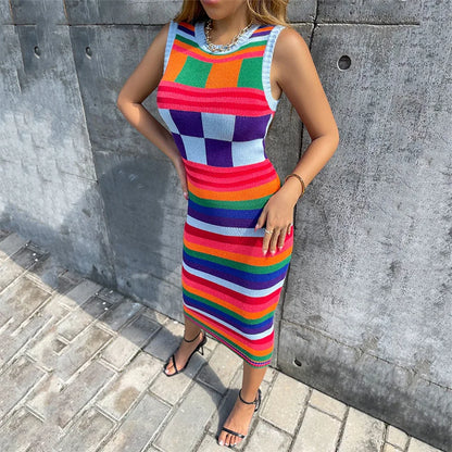 Stylish contrasting color knitted dress for women featuring vibrant stripes and a fitted design