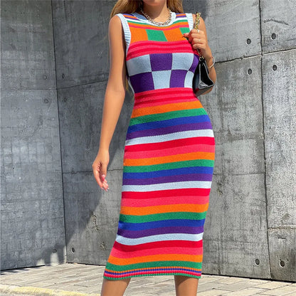 Colorful contrasting color knitted dress for women featuring vibrant stripes and a fitted silhouette