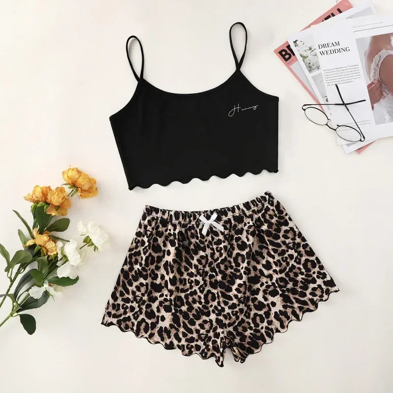 EtherealBe alien sleepwear set for women black scalloped cami with thin straps and leopard print scallop shorts flat lay