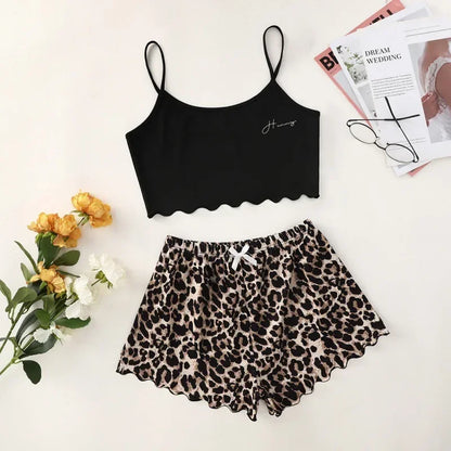 EtherealBe alien sleepwear set for women black scalloped cami with thin straps and leopard print scallop shorts flat lay