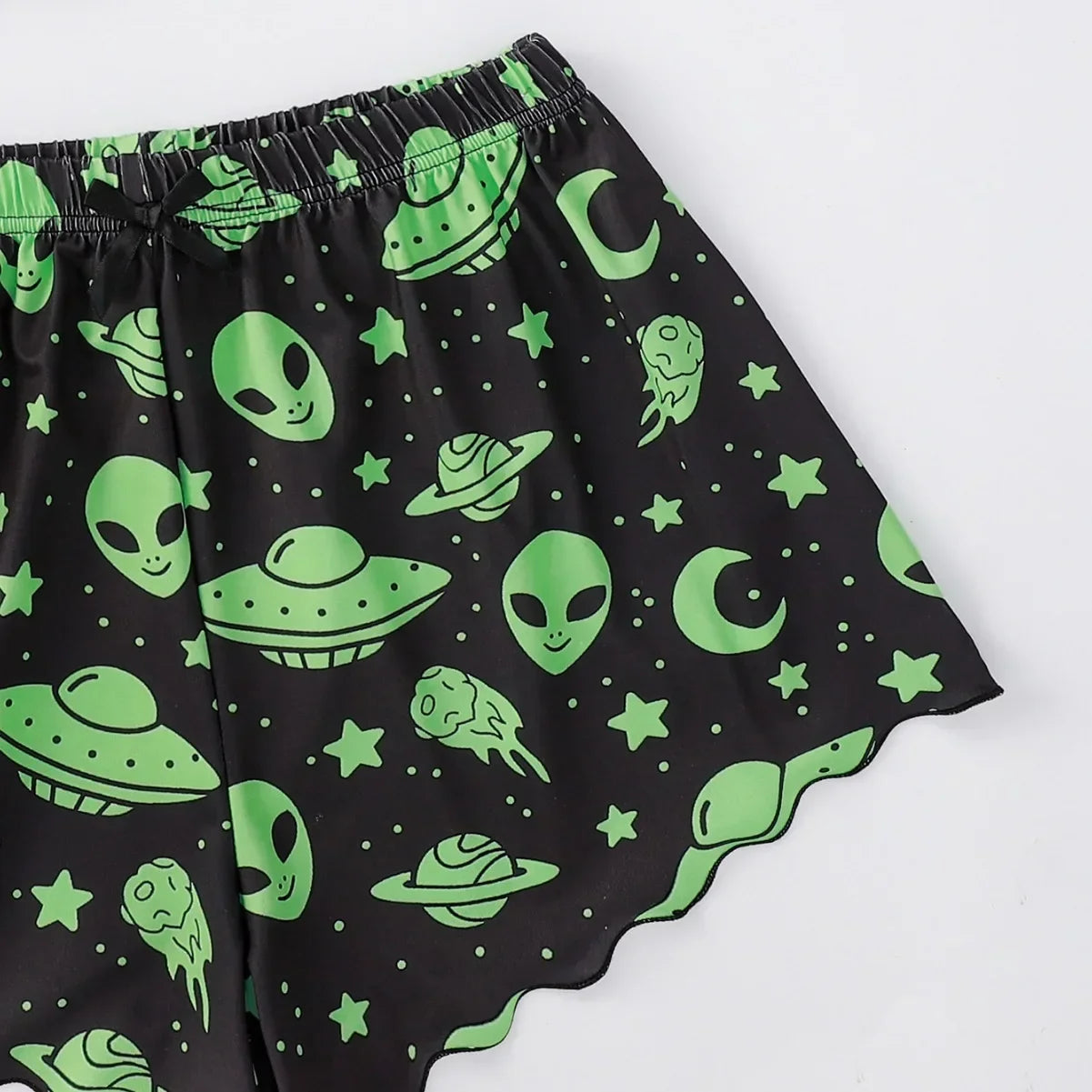 Black pajama shorts with bright green alien UFO moon and star print alien sleepwear set for women