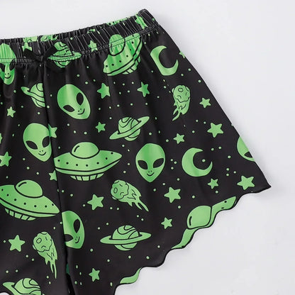 Black pajama shorts with bright green alien UFO moon and star print alien sleepwear set for women