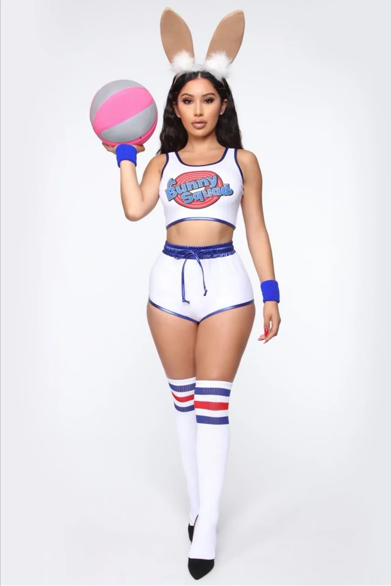 Model wearing space jam Lola Bunny shorts and top cosplay white crop top and shorts with bunny ears and pink basketball