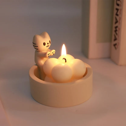 Cute cat tealight holder with a smiling cat figure and a candle in a cloud-shaped base