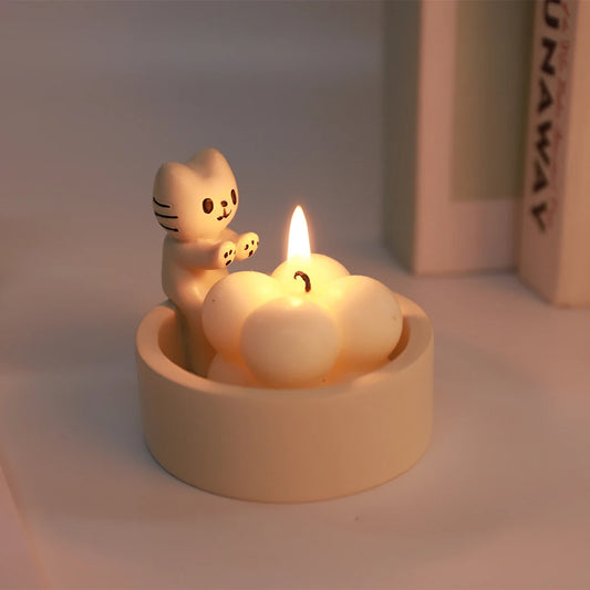 Cute cat tealight holder with a smiling cat figure and a candle in a cloud-shaped base