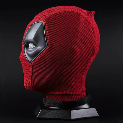 Red textured Deadpool costume mask for Halloween. Side profile on black display stand showing molded eye detail