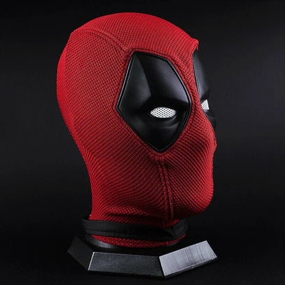 EtherealBe red knit Deadpool costume mask for Halloween. Displayed on a head form with black eye patches and white mesh lenses