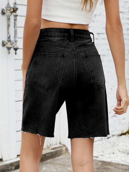 Back view of EtherealBe distressed denim shorts for women with a frayed hem and classic pockets