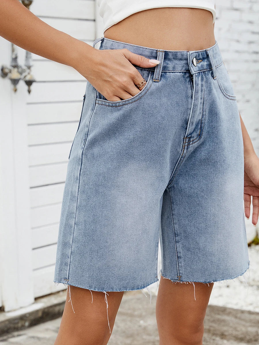 EtherealBe distressed denim shorts for women in light blue with a relaxed fit and frayed hem