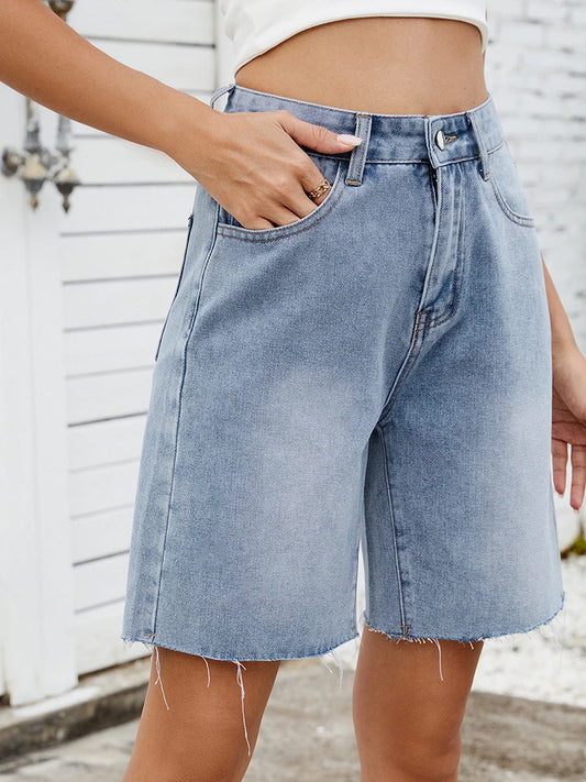 EtherealBe distressed denim shorts for women in light blue with a relaxed fit and frayed hem