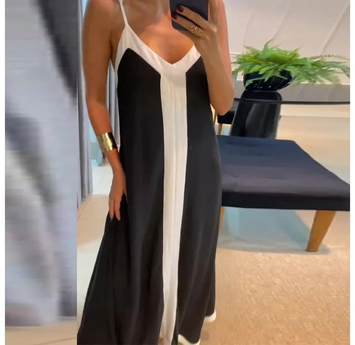 EtherealBe black and white sleeveless maxi dress featuring a stylish split design and elegant fit
