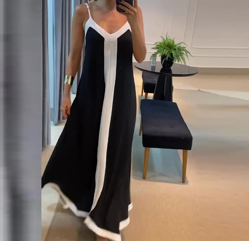 EtherealBe black and white sleeveless maxi dress featuring a stylish v-neck and contrasting trim