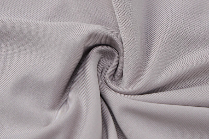 EtherealBe soft light gray stretch fabric close up detail showing texture and drape for bodycon romper for women