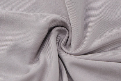 EtherealBe soft light gray stretch fabric close up detail showing texture and drape for bodycon romper for women