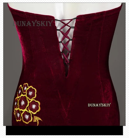 Close-up of Resident Evil Ada Wong cosplay costume featuring a velvet bodice and floral embroidery