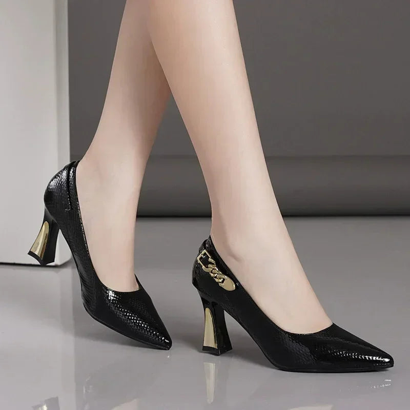 EtherealBe elegant designer party pumps in black with stylish gold heels for a chic look