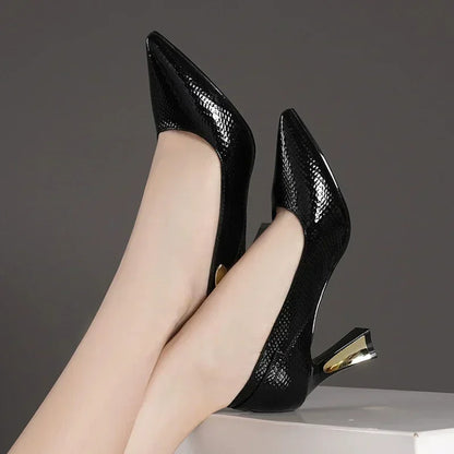 EtherealBe elegant designer party pumps in black with a stylish pointed toe and unique heel design
