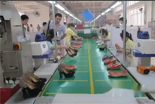 EtherealBe elegant designer party pumps on a production line in a shoe factory