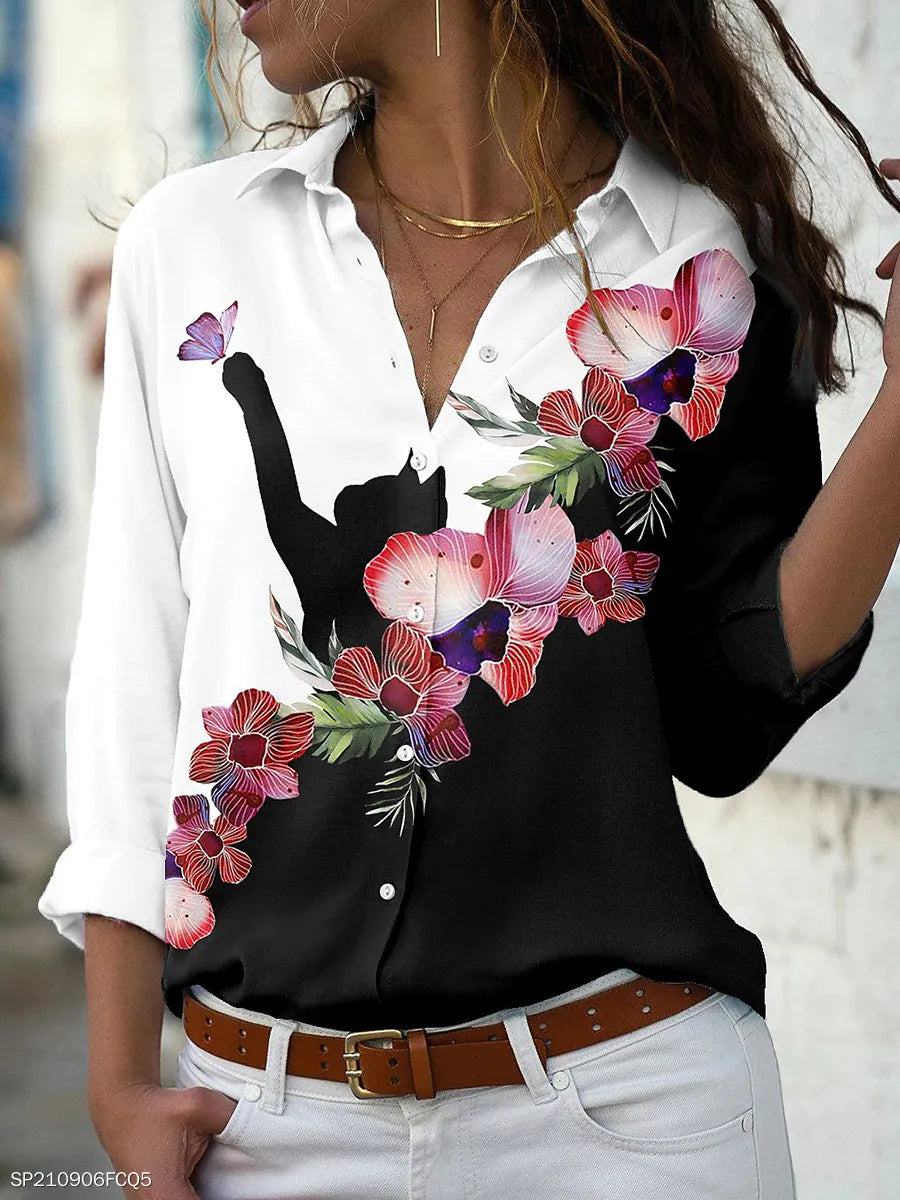 EtherealBe elegant floral print blouse for women with colorful floral design on black and white fabric