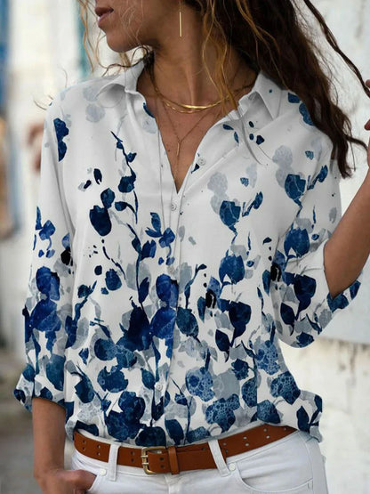 EtherealBe elegant floral print blouse for women in blue with button-down style and rolled sleeves