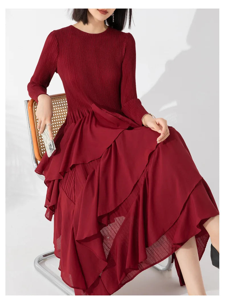 EtherealBe elegant layered ruffle cake dress in burgundy with long sleeves and a flowing silhouette