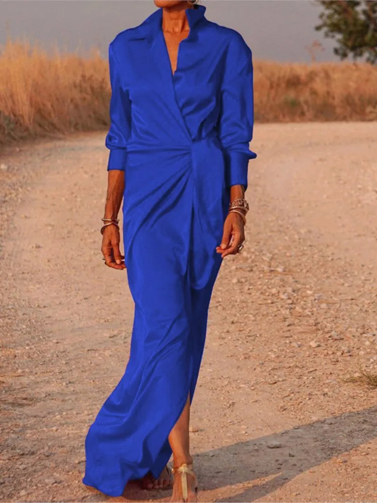 EtherealBe elegant long sleeve split dress in blue on a scenic outdoor path