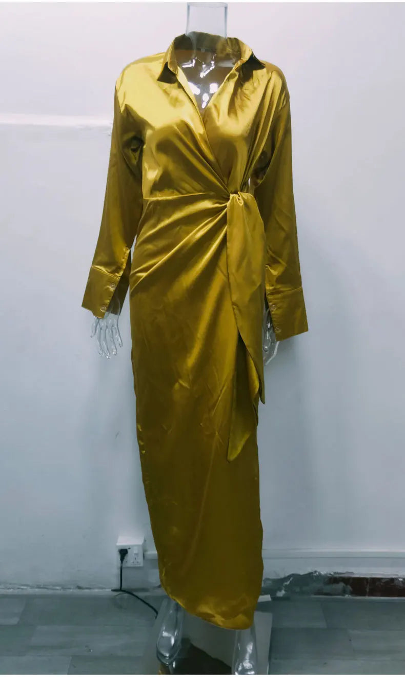 EtherealBe elegant long sleeve split dress in gold with a stylish wrap design and satin finish