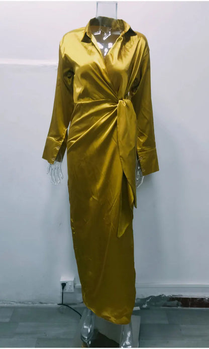 EtherealBe elegant long sleeve split dress in gold with a stylish wrap design and satin finish