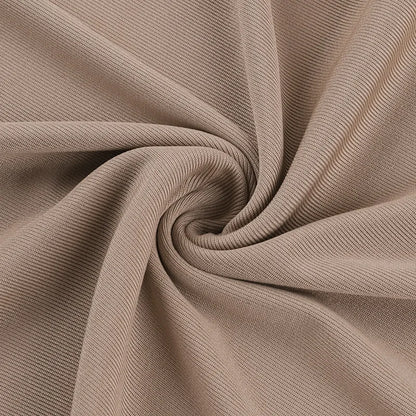 Soft beige fabric showcasing texture for an elegant off shoulder evening dress