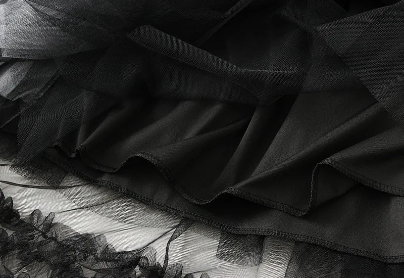 EtherealBe elegant ruffle edge skirt for women with layered black tulle design and soft fabric texture