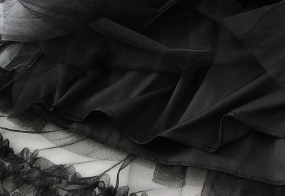 EtherealBe elegant ruffle edge skirt for women with layered black tulle design and soft fabric texture
