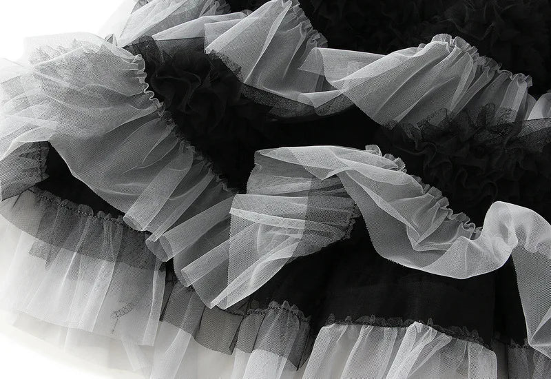 EtherealBe elegant ruffle edge skirt for women featuring layers of black and white tulle fabric