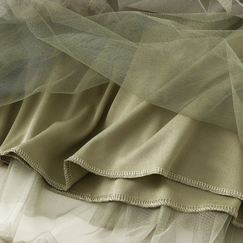 Elegant ruffle edge skirt for women in soft olive green tulle with layered design