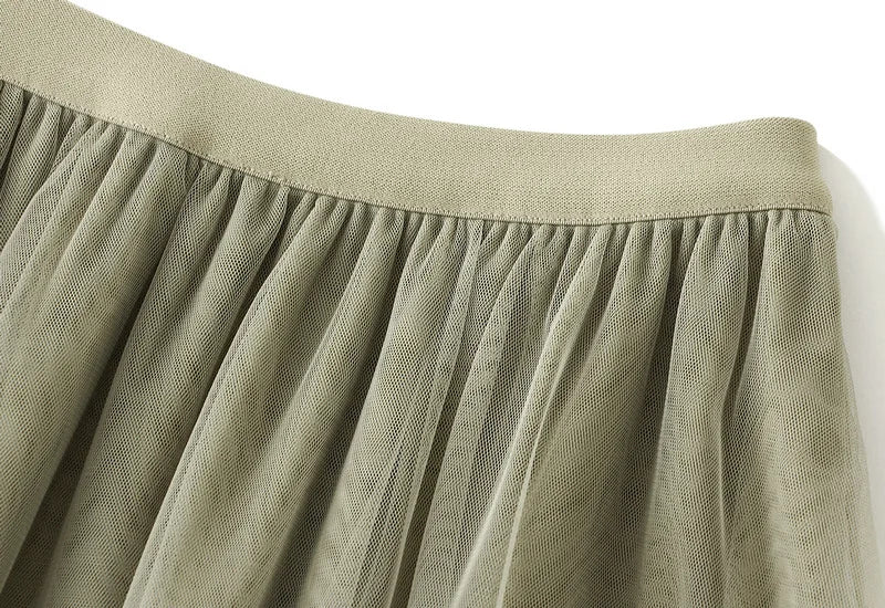 EtherealBe elegant ruffle edge skirt for women in soft green fabric with detailed pleats