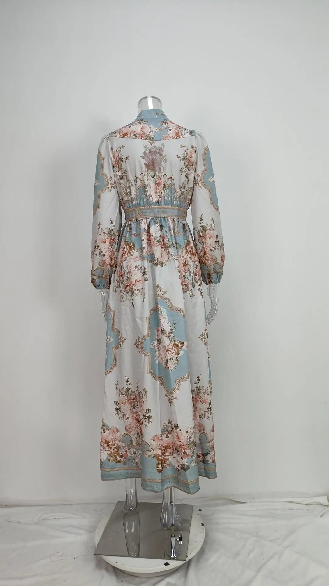 Back view of EtherealBe vintage autumn dress for women with long sleeves smocked waist and floral print