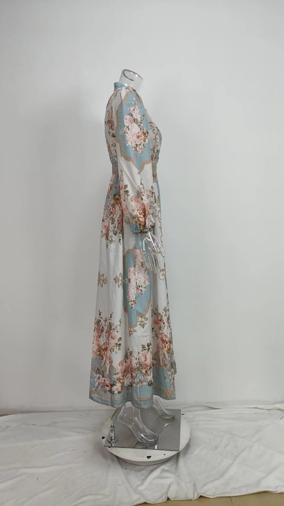 EtherealBe floral maxi dress on mannequin side view showing long sleeves tie waist and ankle length vintage autumn dress for women