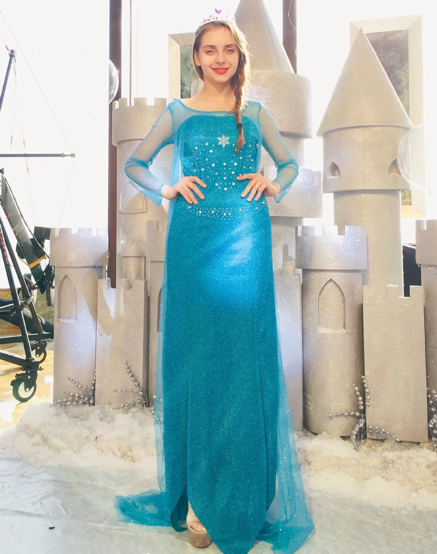 EtherealBe Elsa adult cosplay costume featuring a sparkling blue gown and elegant design