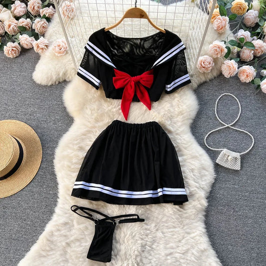 EtherealBe erotic sailor cosplay costume featuring a short skirt, bow, and sheer top for playful style