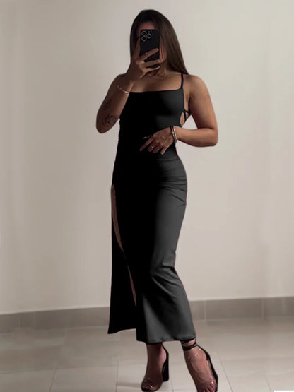 Elegant black high slit backless evening dress with a sleek silhouette and stylish straps