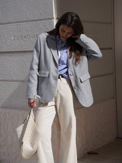 EtherealBe Fashion Blazer for women in gray, styled with a blue shirt and cream pants
