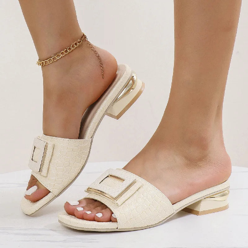 EtherealBe fashion low heel open toe mules in cream with a stylish buckle design